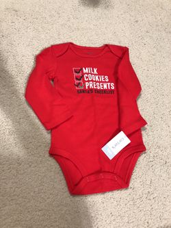 BRAND NEW: Carter’s onesie in size 18 Months