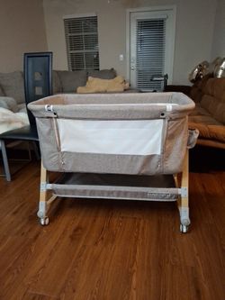 HARPA Gray Rectangle Baby Bassinet with Wheels and Storage Basket