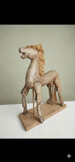 Vintage wooden horse sculpture