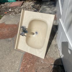 Bathroom sink  24 x 18withnewfawcett and all under Harware included at a great price!! $10 hurry this price it won’t last… We located in Miami Beach o