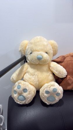 Cream Plush Teddy Bear with Blue Paw Details