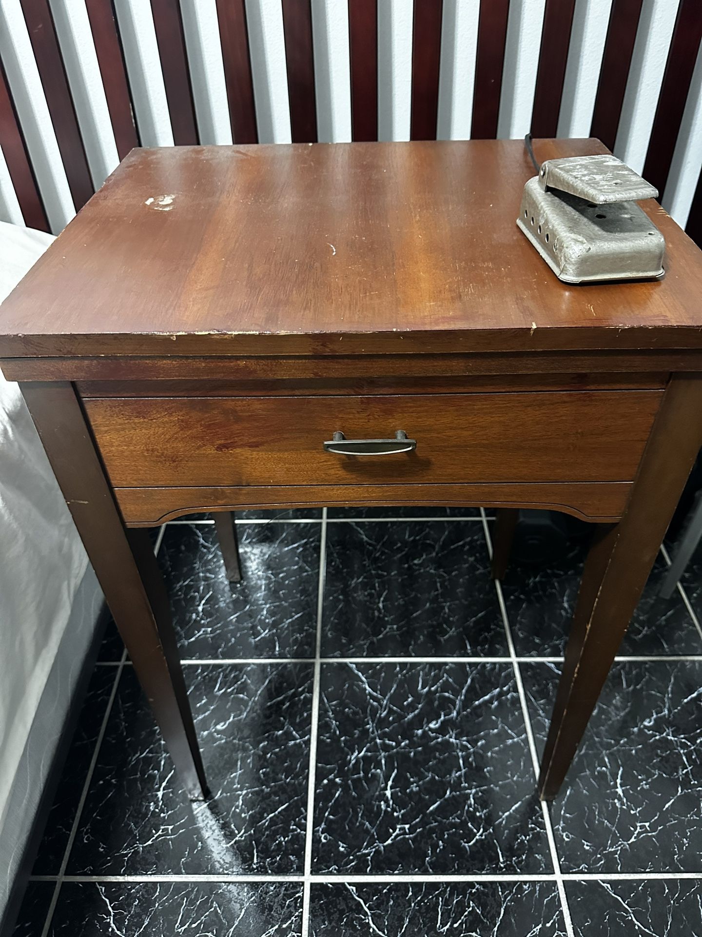 Sear Kenmore sewing machine in original fold out wood cabinet