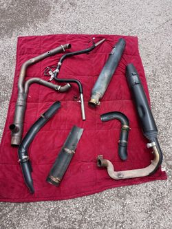 2024 Harley Davidson Road Glide Factory Handle Bars and 2024 Harley Davidson Road Glide Factory Pipes./(Best Offer)Pick Up Only.