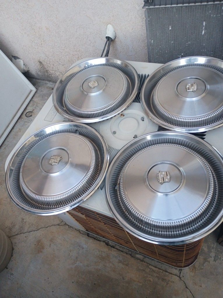 4  1(contact info removed)  Cadillac Hubcaps