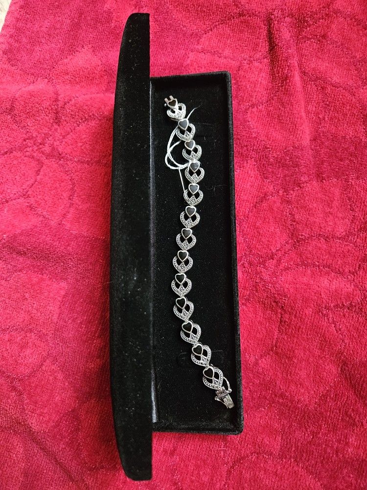 vintage sterling silver bracelet with black onyx and marcasite heart-shaped links