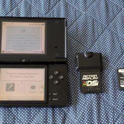 Nintendo Dsi With Charger Action Replay And Transformers Game