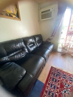 Leather couch sorry mid camera quality but in amazing shape