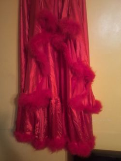 Red feather silk satin robe.  Fit 6 to 7 ft. Person