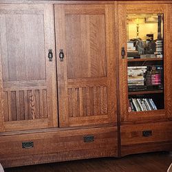 Beautiful Solid wood Armoire On Wheels.  Very Heavy