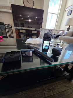 Insta 360 x5 with selfie stick lens cover and extra battery