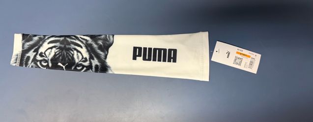 The Puma Pulsic Arm Sleeve is engineered to provide a supportive and performance-enhancing fit for athletes of all levels. Designed with a compression