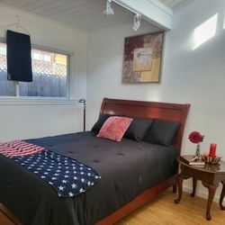 QUEEN SIZE BED FRAME & ANTIQUE SIDE TABLE ((NO MATTRESS)) VERY GOOD CONDITION FIRM $250