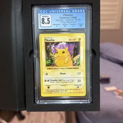 CGC 8.5 “Pikachu” Base Set, 1st Edition GHOST STAMP Error.