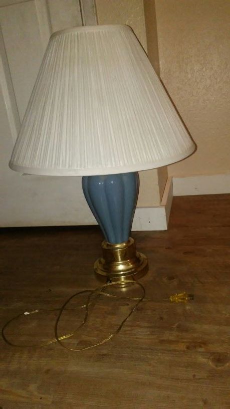 2 blue lamps with shades