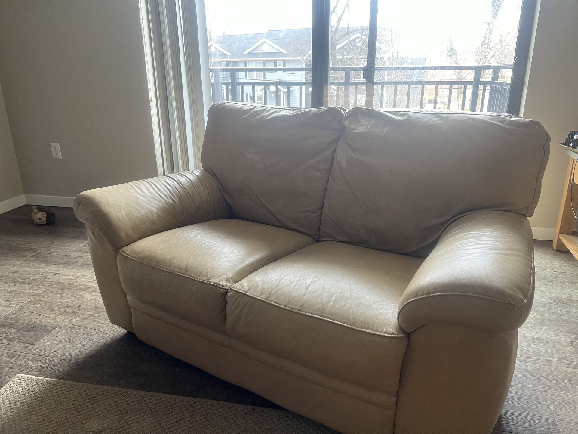Two Sofas With A Chair + Ottoman