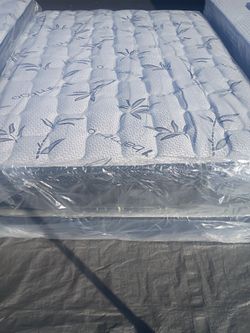 Brand new queen size pillowtop mattress and box spring free delivery depends on location