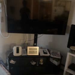 48 inch TLC TV, Stand and color fireplace package deal