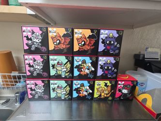 Hello kitty godzilla toys