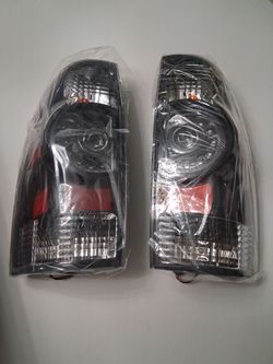 Tail Light Assembly provides a direct fit replacement for the 2005 to 2015 Toyota Tacoma tail lights with a black border. Built for durabili