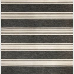 New in the package 7’ x 10’ Mineral Springs Outdoor Area Rug, Huntington Stripe, from India.