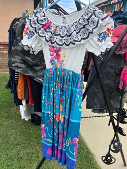 Mirabel Madrigal costume from the movie Encanto is like size  5/6