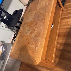 Solid Wood Coffee Table – $35  Sturdy real wood coffee table with storage shelf.   Good condition with normal wear from use.   Clean, strong, and read
