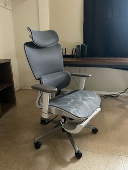 HBADA ergonomic chair with leg rests