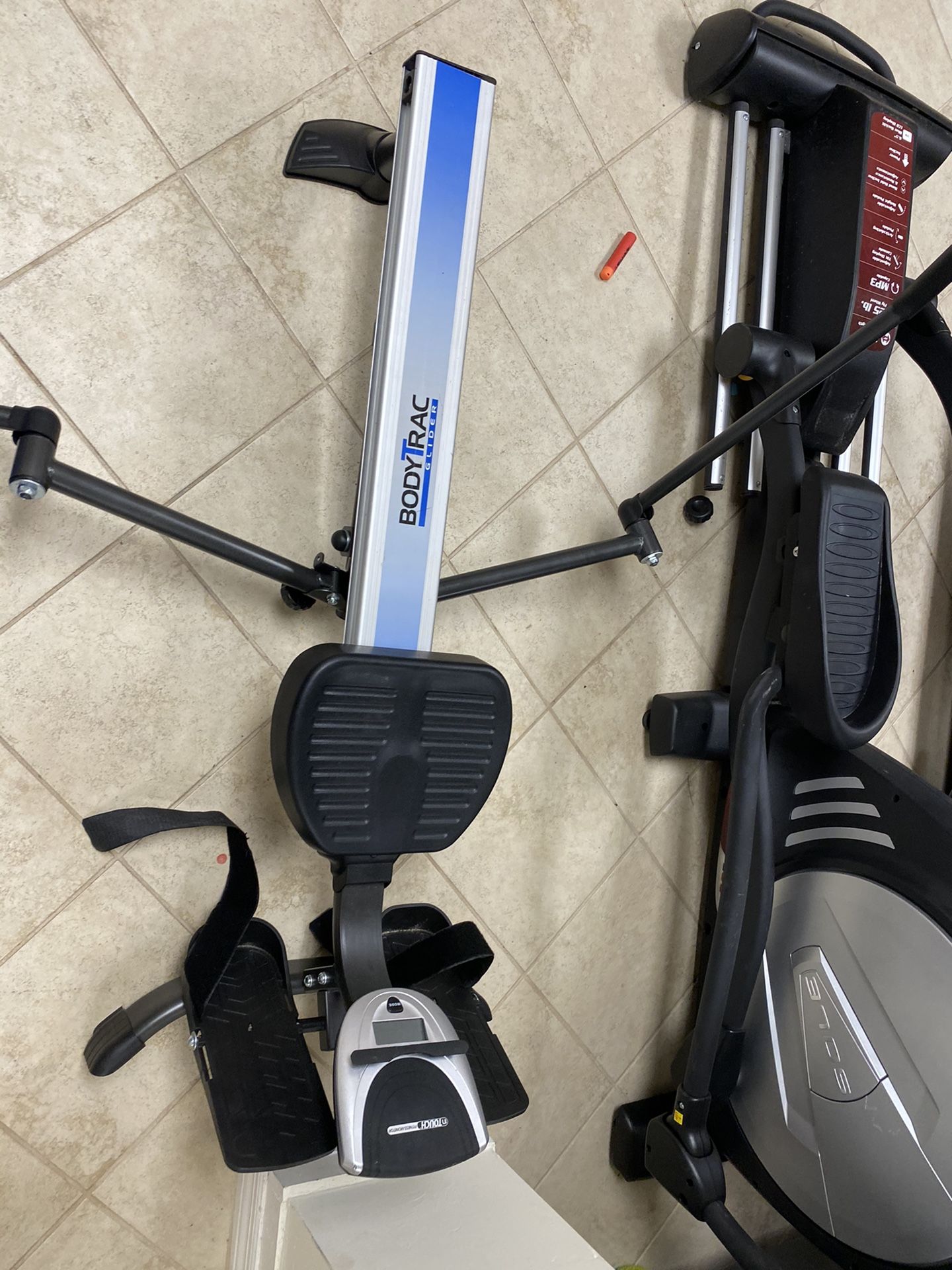 Body trac glider row machine
