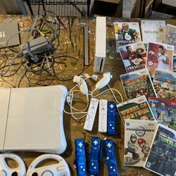 Wii Console, Wii Fit Balance Board, Controllers, Accessories and games