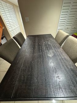Long dining table with 4 chairs