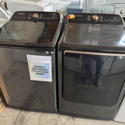 BLACK STAINLESS SAMSUNG TOP LOAD WASHER & ELECTRIC DRYER SET 
