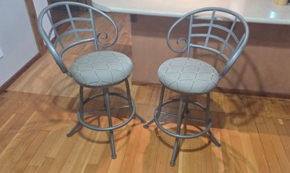Calee Walton swivel bar stools.