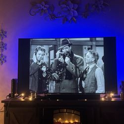 TCL 55’ 4K Roku  TV With Surround bar 
