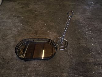 paper towel holder and a mirrored tray