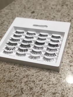 Eyelashes 12 pack comes with two glues