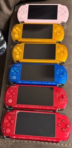 PSP 3000 with 100 games installed and new battery and charger