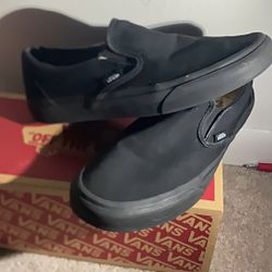 All black vans 