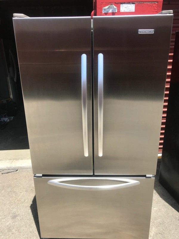 Refrigerator brand kicheaid water and internal ice measures 36 wide and 70 high 3 months warranty delivery and installation