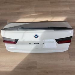 Title is g20 2021 trunk with carbon fiber spoiler and back taillights 