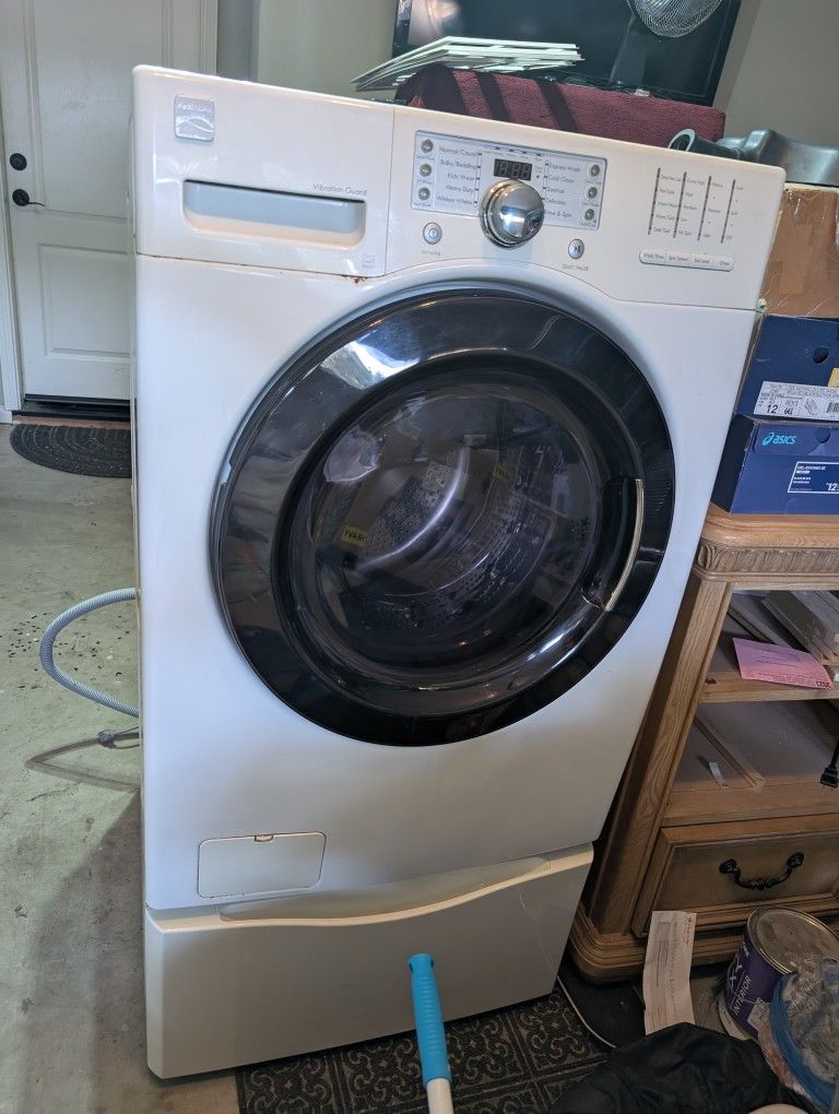 Kenmore LG Front loading dryer on pedestals