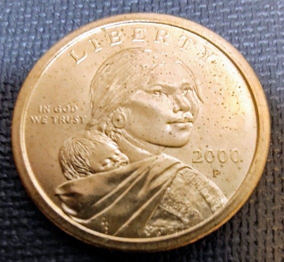 2000-P SACAGAWEA GOLD Tone Coin Uncirculated With Sintering Spots From Us Mint Roll.