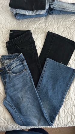 2 pairs of flared jeans
