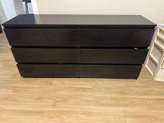 60.5” black 6 drawer dresser with wooden grain finish.