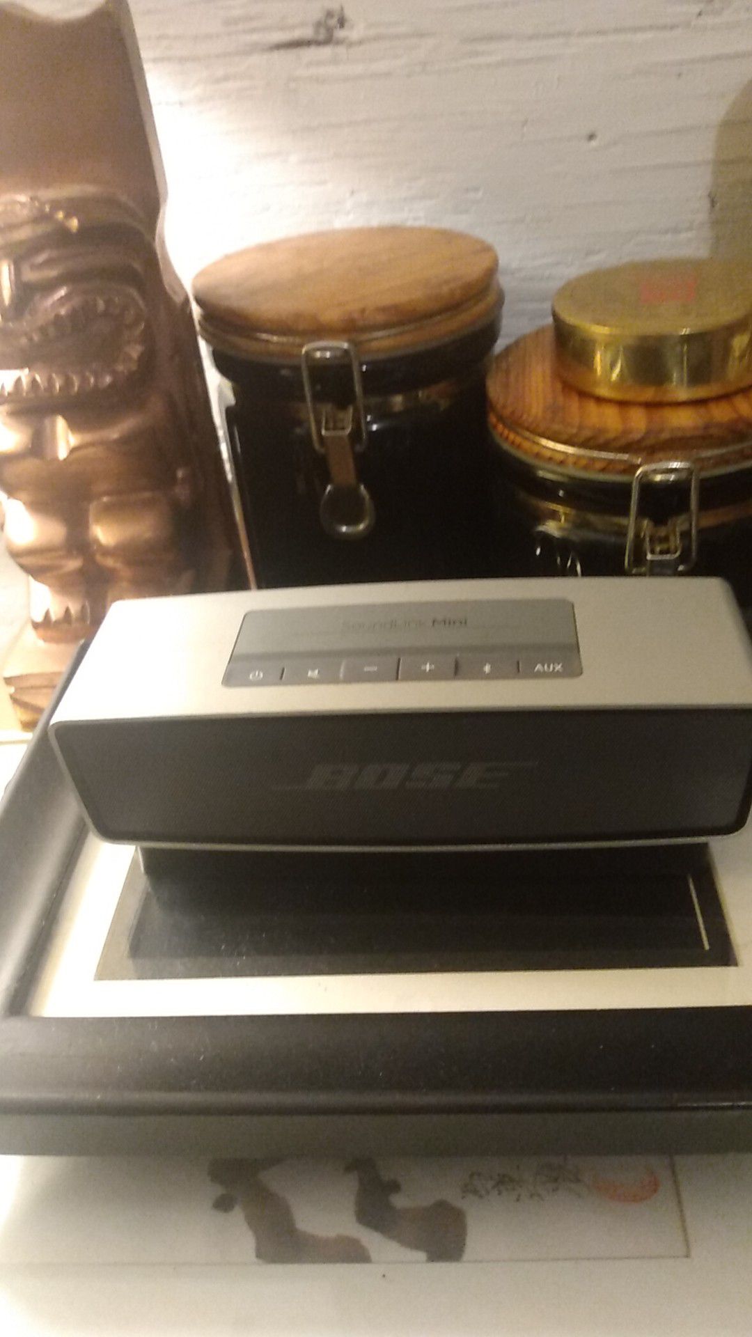 Bose soundlink mini and docking station charging pad,