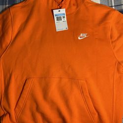 M orange Nike sweatshirt