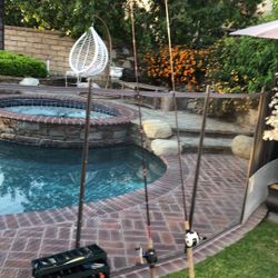 Two Casting Fishing Rods with Reels(Shimano & Quantum) Plus a Large Plano Tackle Loaded Box.