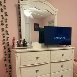 Ashley Exquisite 6-drawer dresser, Ashley Full Sleigh Bed, Ashley Exquisite Two Drawer Nightstand, Ashley White French 3-drawer dresser.