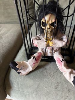 Halloween Skeleton Zombie in Cage Decoration $25 each
