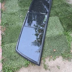 NISSAN HARDBODY  REAR WINDSHIELD 