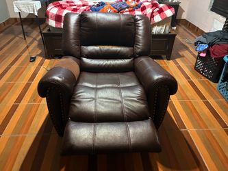 Expressi dark brown rocking chair recliner